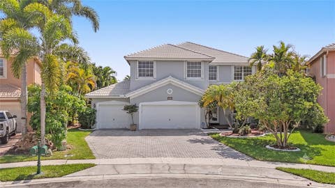 Photo of 694 SW 168th Way, Pembroke Pines, FL 33027 (MLS # A12062141)