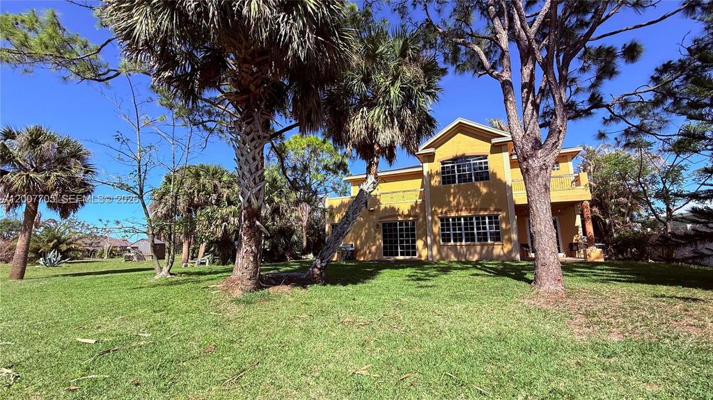 Photo of 633 SW Jada Rd, Port St Lucie, FL 34953 (MLS # A12007705)