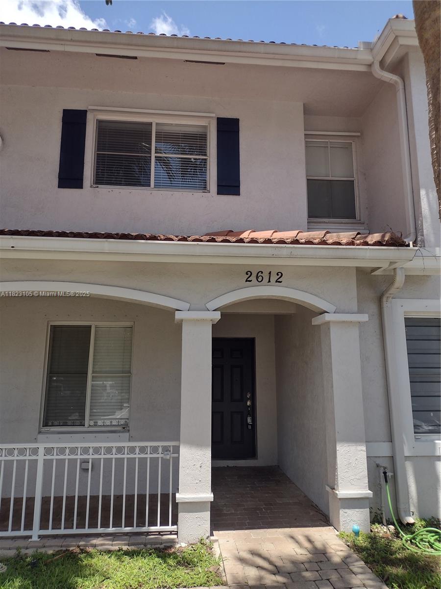 This freshly painted 2/2.5 lakefront townhome features ceramic tile floors downstairs, new laminate floors upstairs, newer AC and appliances, and it shows beautifully! Ideal starter home located in a centrally located gated community with amenities such as a pool and playground, as well as a roving security patrol for your peace of mind. This section of Tuscany has ample reserves for more financing options. **CLICK SHOW ASSIST FOR EZ SHOWING INSTRUCTIONS**