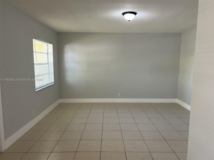 MOVE-IN READY! Make this stunning 2-bedroom, 1-bathroom your dream home! The apartment features tiled floors throughout and freshly painted walls. Kitchen is fully equipped with oven, hood range, refrigerator, and ample cabinet space. Spacious windows in the dining and living rooms. Bedrooms have generous closet space, including 2 walk-in closets in the first bedroom. Central AC and on-site laundry facilities. Building complex is gated for added security.

Schedule a showing today and make this apartment yours!