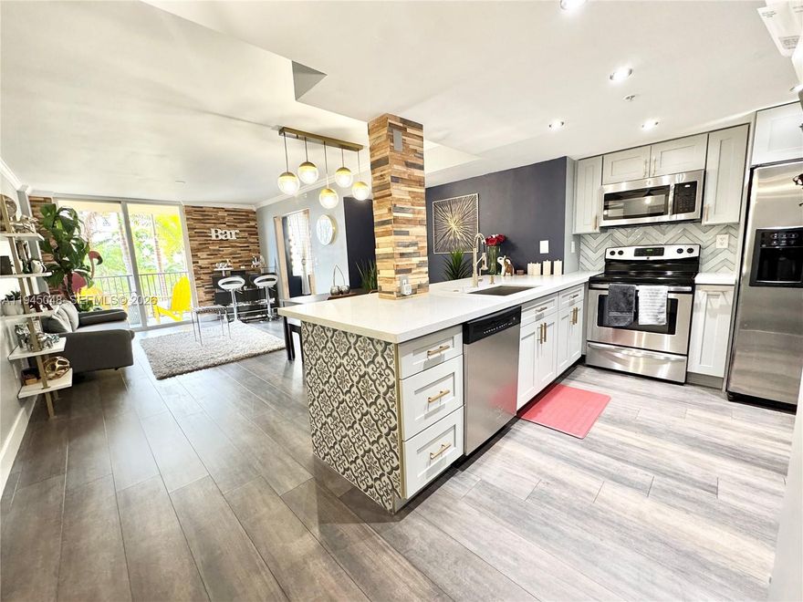 This stylishly upgraded residence boasts contemporary finishes & SPACIOUS DEN that can be used as another room or office! This is the largest unit in the building which also include state-of-the-art gym, serene pool for relaxation, and an aerobics center for those seeking an active lifestyle. With 24-hour security, peace of mind is guaranteed. Nestled alongside the FTL River, this property offers easy access to scenic waterfront views, local dining, shopping, and all the vibrant energy of Fort Lauderdale. This is the ideal residence for those seeking both style and convenience in a premier location. LOW HOA w/ reserves & no assessments!