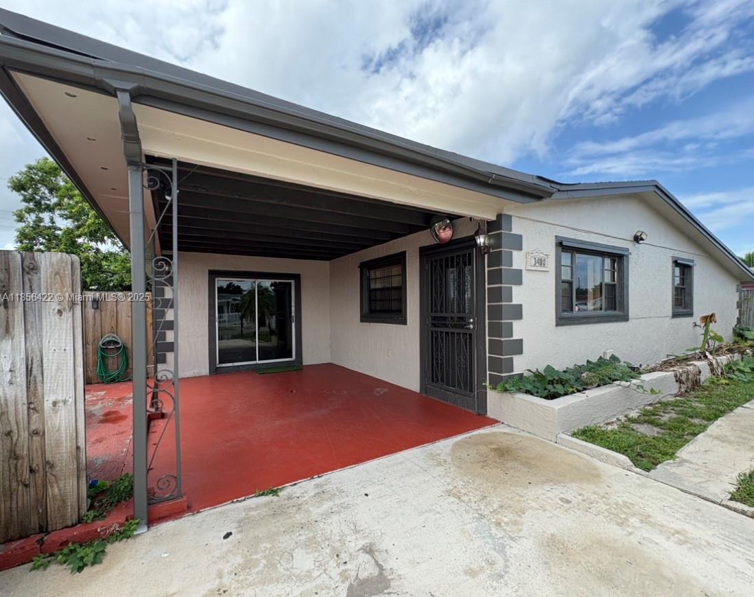This 2-bedroom, 1-bath single-family home offers a spacious feel with a warm, welcoming atmosphere. The well-sized kitchen flows into comfortable living and dining areas, with good sized bedrooms. Covered carport and little sitting area in front. Conveniently located near shopping, dining, schools, Hard Rock Stadium, and major highways, making commuting a breeze.