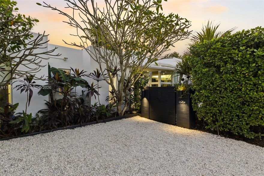 Recently renovated and move-in ready, this 3-bedroom, 2-bath home offers 1,700 sqft of comfortable living space in a centrally located Miami neighborhood. Situated on a corner lot with ample parking, the home features modern updates throughout and a clean, functional layout ideal for everyday living. The spacious primary suite includes a bathroom with dual sinks and opens directly to a private outdoor seating area and patio, creating seamless indoor-outdoor flow. The property also offers a fenced-in side yard and a small private basketball court- perfect for entertaining, kids, or staying active at home. A great opportunity to own a renovated home with usable outdoor space in the heart of Miami.