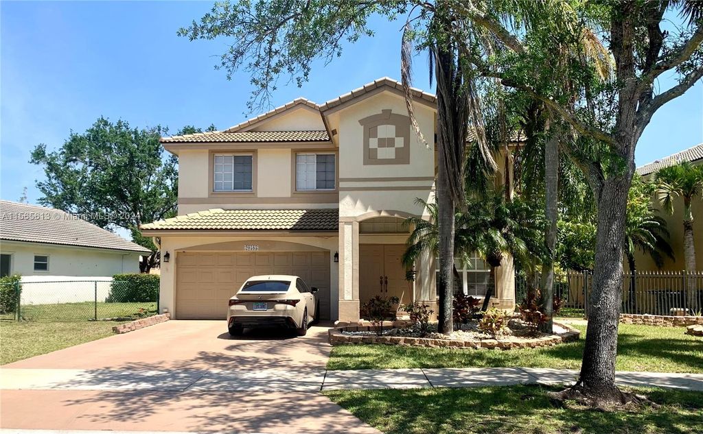 Photo of 20585 SW 5th St, Pembroke Pines, FL 33029 (MLS # A11565613)