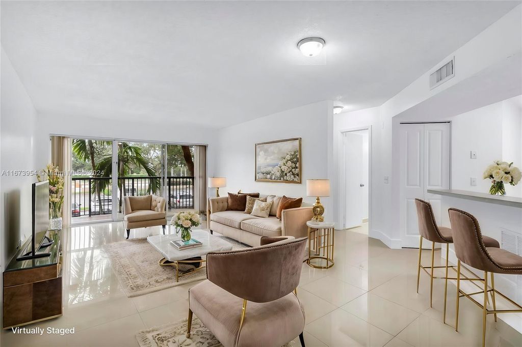 Photo of 8821 Wiles Rd #205, Coral Springs, FL 33067 (MLS # A11673954)