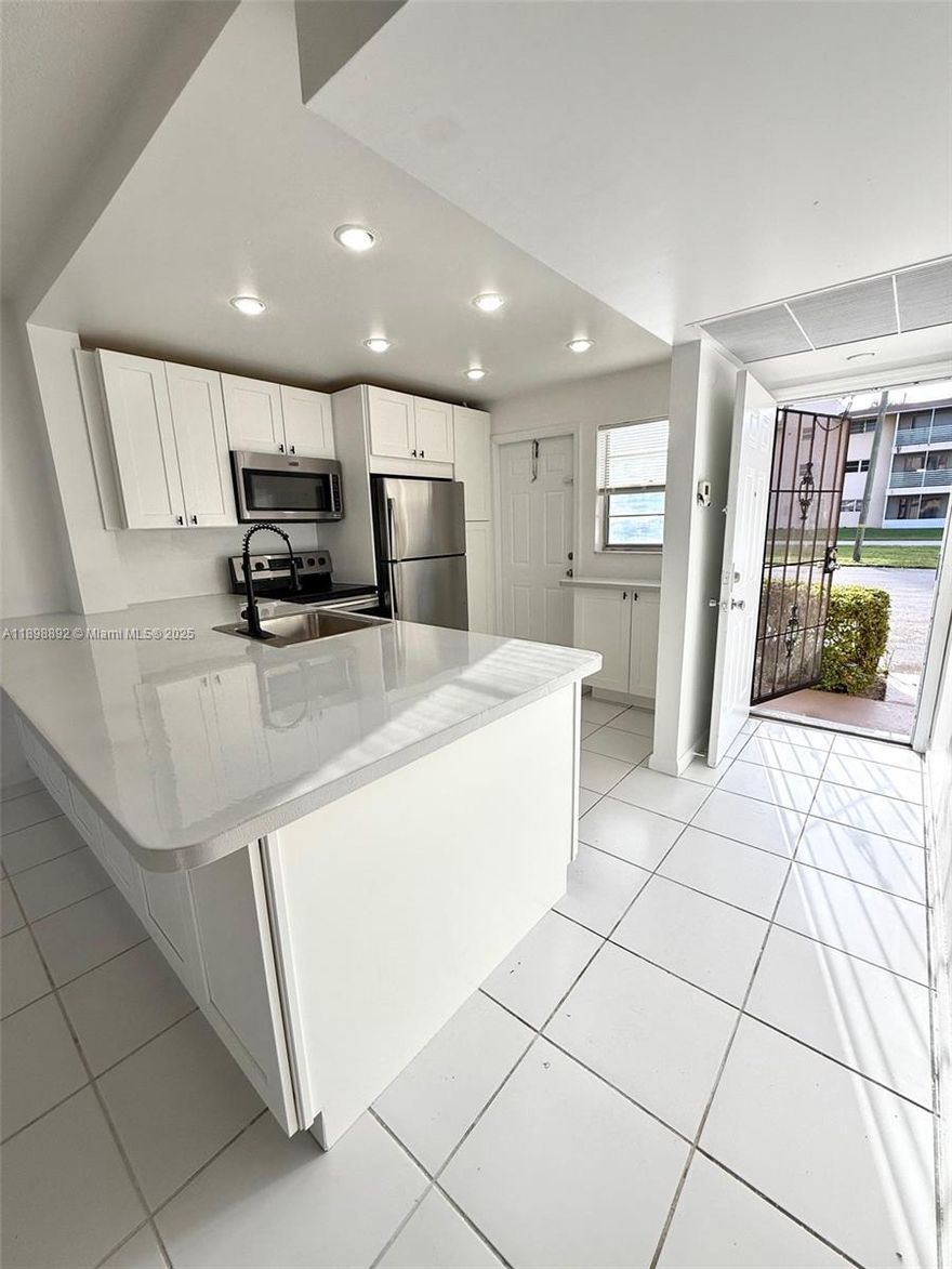 Enjoy georgeous lake views from every window in this beautifully updated first-floor unit, ideally located in the heart of Aventura.This spacious 1-bedroom, 1-bathroom features a generous walk-in closet, a cozy sitting area with lake views, and tile flooring throughout. Open-concept kitchen boasts serene lake views and flows seamlessly into the living space perfect for relaxing. Just steps from the convenient on-site laundry room, this move-in-ready unit is within walking distance to Aventura Mall, houses of worship, top shopping centers, and dining options. Community amenities include a lakeside pool, laundry facilities, security patrol, and regular pest control. Located in the heart of Aventura one of the most desirable locations, this is the perfect place to call home!