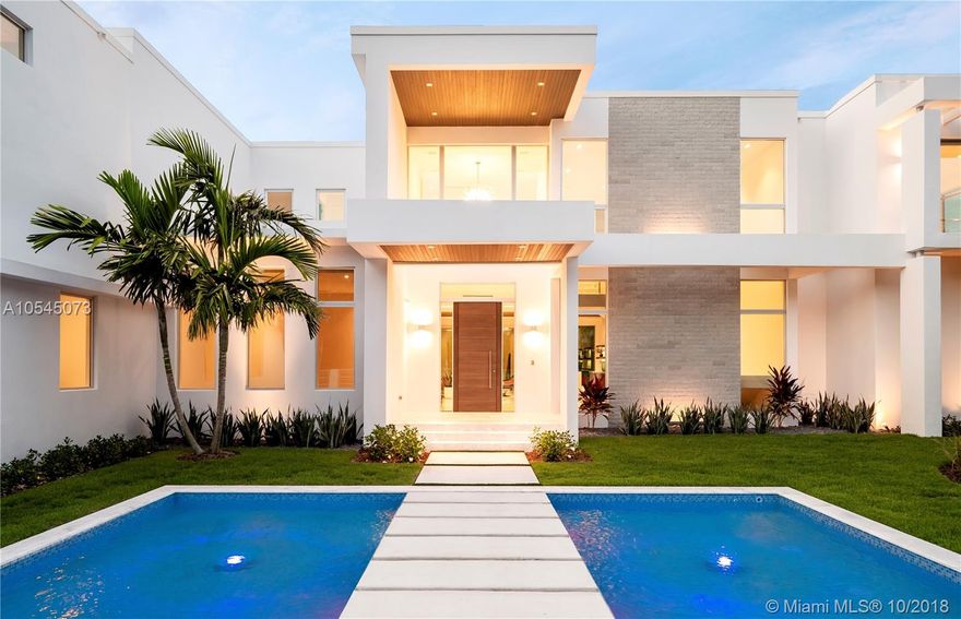 Elegant 2018 Brand-New Modern Estate, Appointed with The Finest Finishes. Approach Your Front Door by Walking Over the Soothing Water Feature. Enter a Spectacular Floor Plan, Full of Amenities, From a Grand & Open Kitchen Featuring Designer Appliances, Living & Dining Rooms, Climate Controlled Wine Cellar, Theater, Grand Master Suite w/Sitting Area, Home Office, Double Water Closets, Massive Closet, To A Stunning Glass Stair Case & Elevator. 36X36 Premier Marble & Wood Floors. Nested on A Deep Lot Allowing Picturistic Views of Backyard from Most Living Areas. Other Features: 2 Laundry Rooms, Smart Integration, LED Lights, Resort Style Pool, Large Impact Glazing, Concrete Roof, Large Covered Summer Kitchen, 3 Car Garage, Fully Gated, Located in Very Quiet Street. Premier Pinecrest Schools.