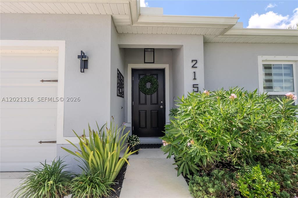 Photo of 215 Raspberry Rd, Fort Pierce, FL 34981 (MLS # A12021316)