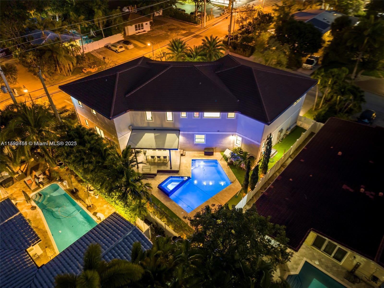 This 7,000 sq ft mansion is within walking distance to the beautiful beaches, major grocery stores, pharmacies, bars & restaurants! 20 Minutes to FLL and 45 mins from MIA and South Beach. Huge landscaped and furnished backyard with BBQ grill, heated pool, and jacuzzi. Modern kitchen appliances. 4K TVs. In-house washer/dryer. Comfortable hotel-grade beds & mattresses. State of the art furniture. This home is unique and will surpass all expectations.