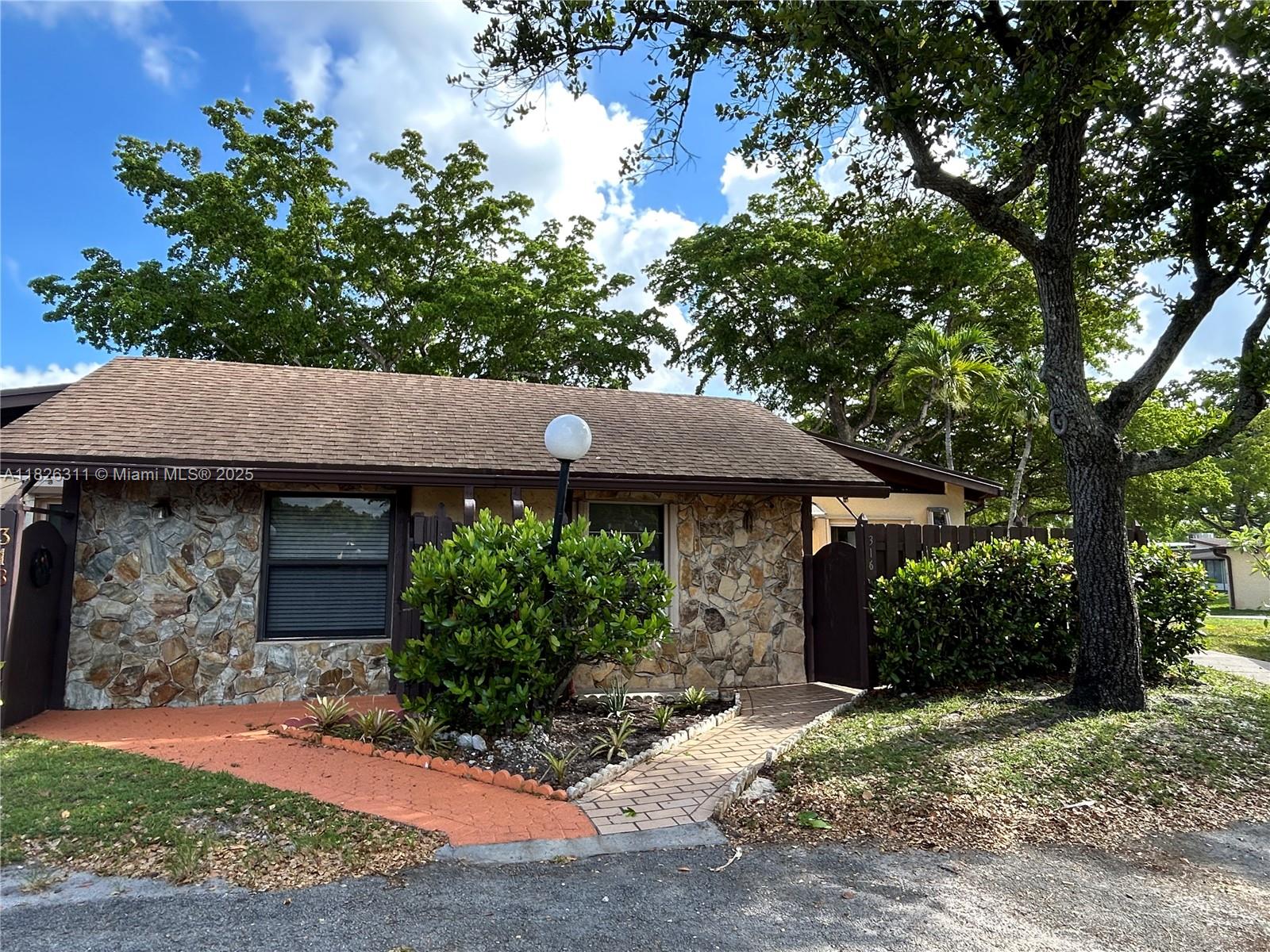 STUNNING LAKE FRONT CORNER VILLA IN HIGHLY DESIRABLE CARRIAGE HILLS SENIOR COMMUNITY! SUBSTANTIALLY REMODELED, BRIGHT, SPACIOUS, AND FULL OF UPGRADES. FEATURES APPROX. 200 SQ FT OF EXTRA LIVING AREA—IDEAL AS A 3RD BEDROOM, OFFICE, OR DEN. ENJOY A PRIVATE FRONT PATIO AND A SCREENED BACK PORCH WITH BEAUTIFUL GARDEN & LAKE VIEWS. CERAMIC AND LAMINATE FLOORS THROUGHOUT. TONS OF STORAGE. RESORT-STYLE AMENITIES: TENNIS, BASKETBALL, POOLS, CLUBHOUSE, GYM, SAUNA, GAME ROOM, BBQ AREA, LAKEFRONT WALKING TRAILS & MORE. WALKING DISTANCE TO SHOPS, BANKS, RESTAURANTS. JUST 3 MINS TO HARD ROCK CASINO. EASY ACCESS TO MAJOR HIGHWAYS AND FORT LAUDERDALE AIRPORT.
EASY APPROVAL. DON'T MISS !
CONDO ASSOCIATION REQUIRES 650 CREDIT N 1 PERSON MUST BE 55