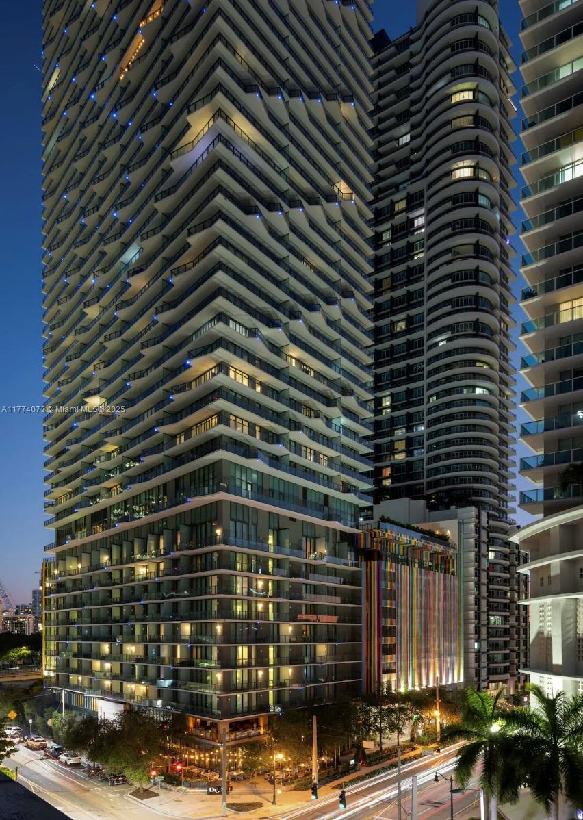 Experience luxury living in this exquisite 2-bedroom, 2-bathroom + den unit at Dua Miami. Featuring sleek Italian-style kitchen cabinets, top-of-the-line appliances, and custom California closets, this residence offers the ultimate in comfort and style. Enjoy world-class amenities, including multiple pools, a poolside bar, a state-of-the-art gym, a massage and spinning room, a game center, a theater, a party room, and an on-site restaurant.