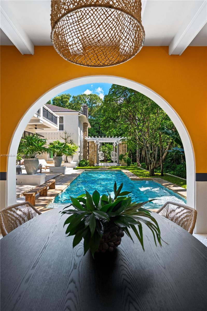 New construction, luxury home designed by renowned architect Jorge L. Hernandez is a luxury oasis offering the perfect blend of privacy and convenience in the heart of Coconut Grove. This masterpiece is situated on a nearly half-acre property behind a gated private lane with 6 bedrooms, 5 bathrooms, 2 half baths and stunning living spaces. Enjoy outdoor amenities, including a summer kitchen, lap pool, and expansive living areas. Unique to this property is a historic cottage seamlessly integrated with the new home, charming garden pergolas, trellises, porches, and a historic coral stone wall pays homage to the classic Coconut Grove style. Walk from this incredible property in South Grove to Miami's finest private schools, restaurants, shopping, and entertainment in Downtown Coconut Grove.