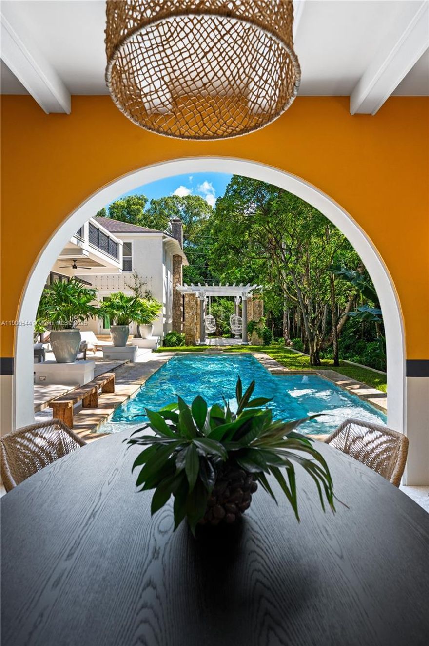 New construction, luxury home designed by renowned architect Jorge L. Hernandez is a luxury oasis offering the perfect blend of privacy and convenience in the heart of Coconut Grove. This masterpiece is situated on a nearly half-acre property behind a gated private lane with 6 bedrooms, 5 bathrooms, 2 half baths and stunning living spaces. Enjoy outdoor amenities, including a summer kitchen, lap pool, and expansive living areas. Unique to this property is a historic cottage seamlessly integrated with the new home, charming garden pergolas, trellises, porches, and a historic coral stone wall pays homage to the classic Coconut Grove style. Walk from this incredible property in South Grove to Miami's finest private schools, restaurants, shopping, and entertainment in Downtown Coconut Grove.