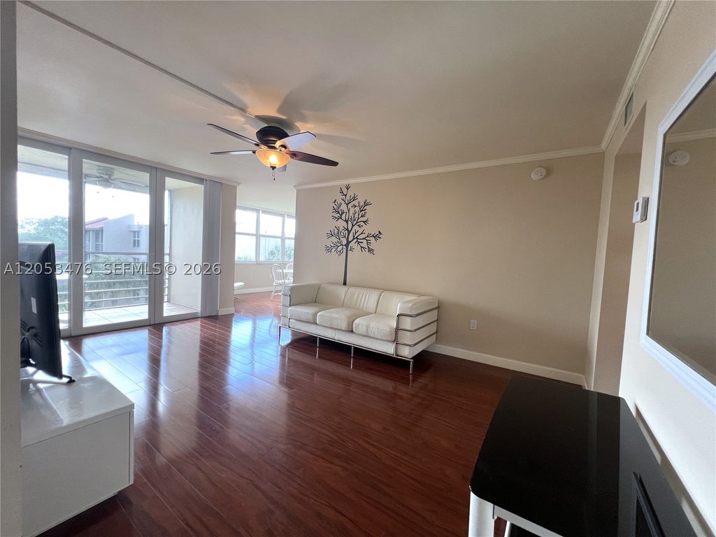 Photo of 9451 Evergreen Pl #407, Davie, FL 33324 (MLS # A12053476)