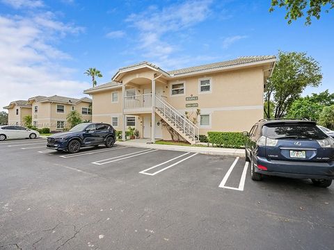 Photo of 12079 Royal Palm Blvd #8I, Coral Springs, FL 33065 (MLS # A11866193)