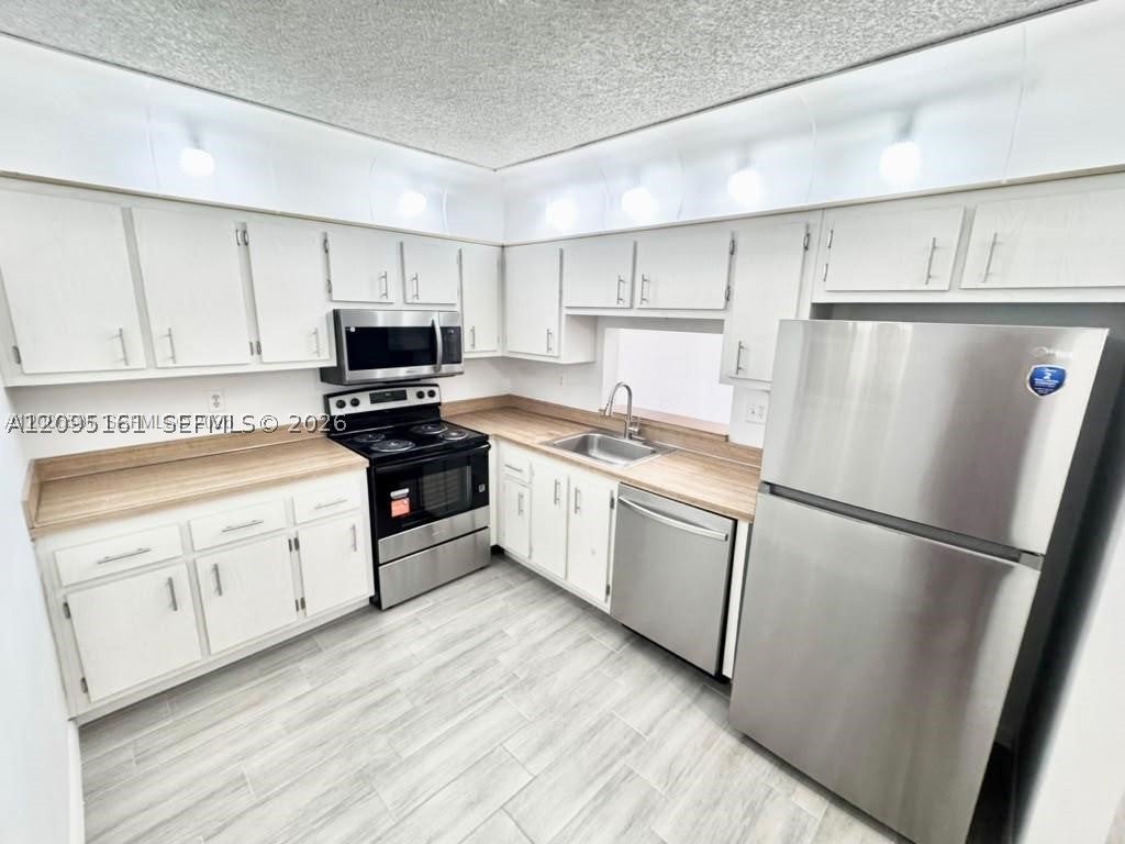 Photo of 1800 SW 81st Ave #1204, North Lauderdale, FL 33068 (MLS # A12095161)