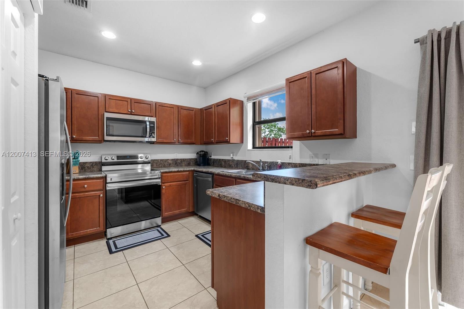 CENTURY GARDENS AT TAMIAM - Residential