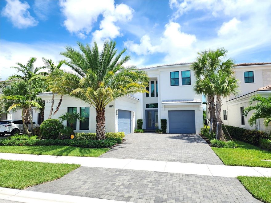 This stunning, spacious home has a water and sunrise view. Very few homes at this price can compare. It's in a Beautiful New Gated community with modern amenities. Located just north of PGA National and west of Juno Beach, it's a golfer/beachgoer paradise.