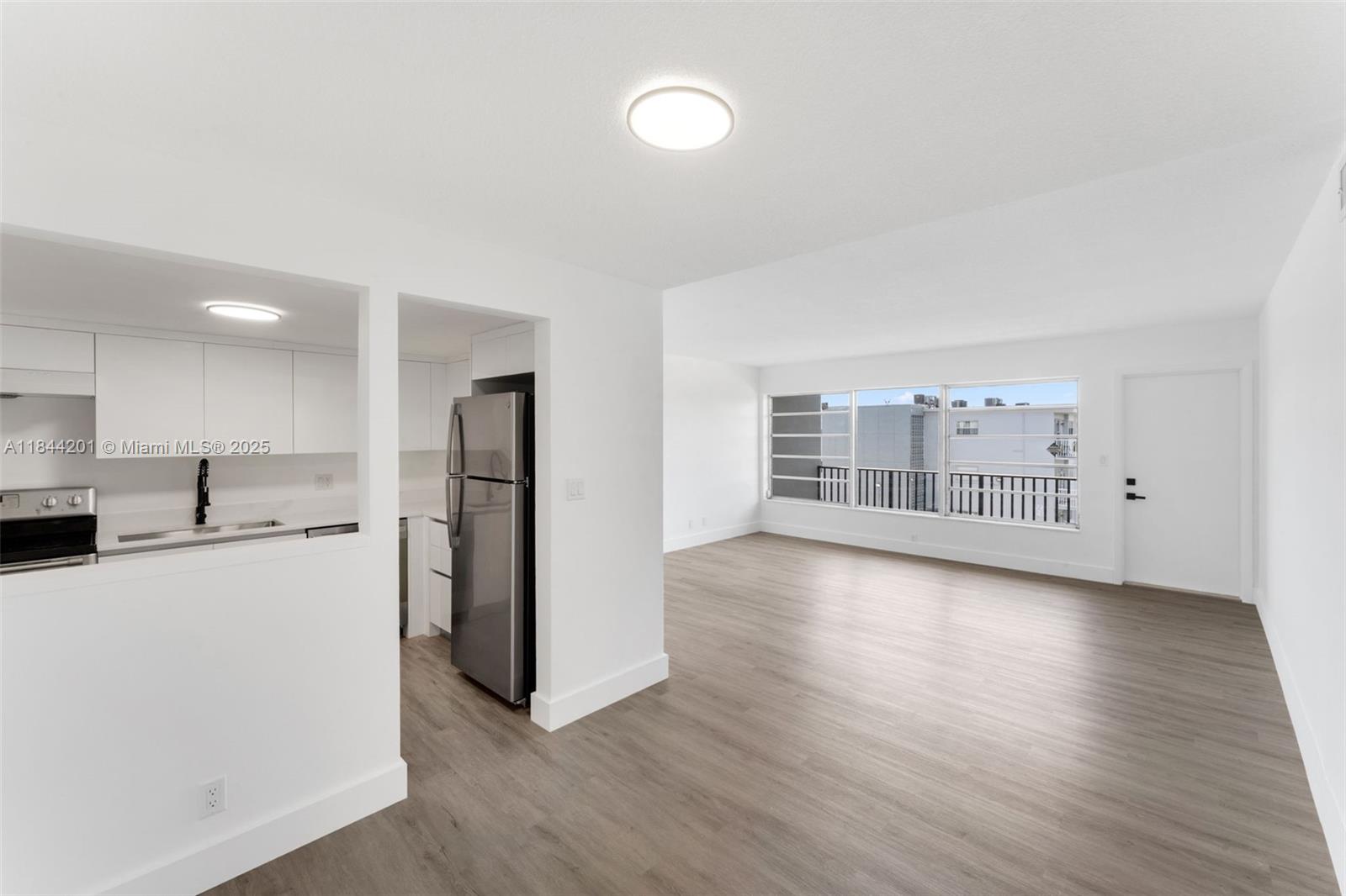 Just completely remodeled 2BR/2BA condo in the heart of North Miami Beach. Features a brand-new kitchen with quartz countertops, sleek cabinetry, and new stainless steel appliances. Spacious layout with open living/dining area, recessed lighting, new flooring, and private balcony. Bathrooms fully renovated with modern tilework, new vanities with porcelain countertops, and updated fixtures. Primary bedroom with en-suite bath and walk-in closet. Secure building with elevator, laundry room, and assigned parking. Prime location near beaches, I-95, shops, restaurants, and houses of worship. Low HOA. Investor-friendly and move-in ready.
