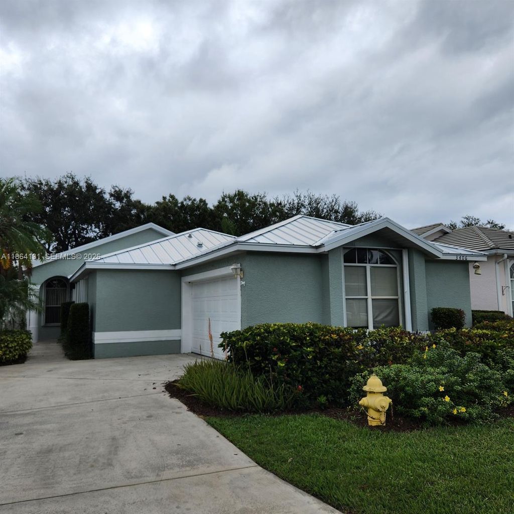 Photo of 3406 SW Coco Palm Dr, Palm City, FL 34990 (MLS # A11864131)