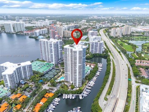 Photo of 3500 Mystic Pointe Dr #1205, Aventura, FL 33180 (MLS # A12030034)
