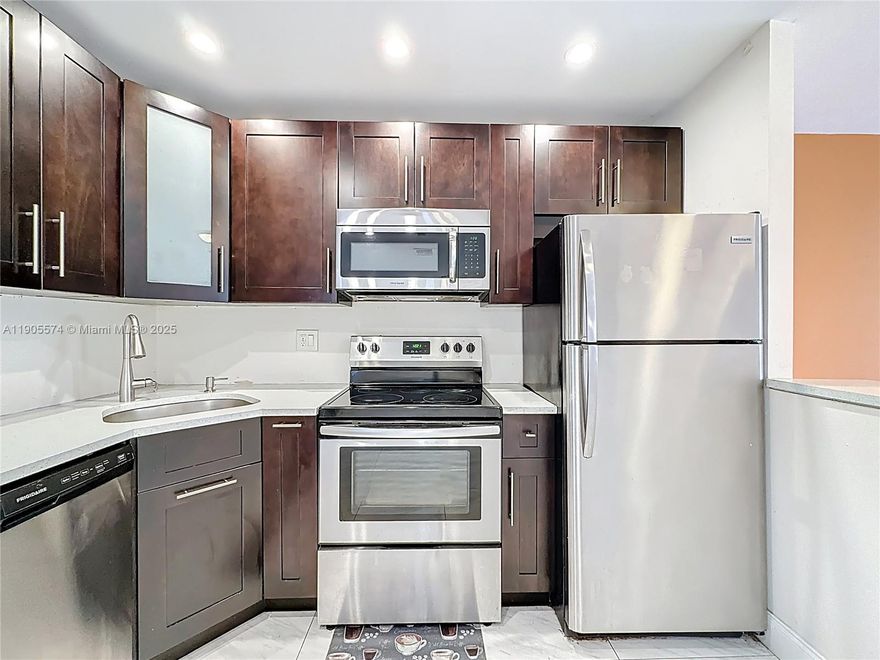 Step into this inviting two-story townhome featuring three spacious bedrooms and two and a half baths. The layout is thoughtfully designed to strike a balance between privacy and comfort. Bedrooms are tucked upstairs while open living and dining spaces flow seamlessly on the main level, creating the perfect home for families, roommates, or anyone who values comfort and functionality. In-unit laundry / central A/C / assigned parking Enjoy peaceful mornings and relaxing evenings with a serene canal view. This home is nestled in the heart of Sunrise, just minutes from shopping centers, schools, major highways, and downtown destinations. Whether you’re commuting for work or heading out for a weekend adventure, everything you need is within easy reach.