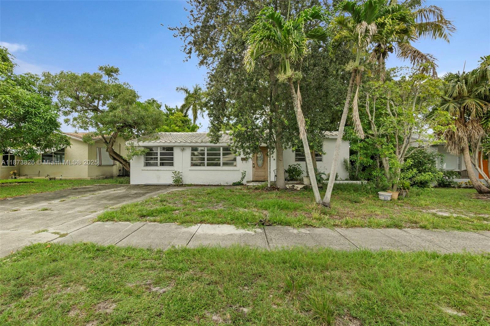 Welcome to this charming single-family home located in the desirable Park Road Manor neighborhood of Hollywood. This home offers 3 spacious bedrooms, 1 bathroom and a dedicated laundry room. 2nd bathroom can easily be added. Outdoors, the oversized backyard offers plenty of room for a pool and outdoor entertaining. Conveniently located near major highways, hospital and lots of shopping and dining options. Short drive to the beach! No association. No restrictions.