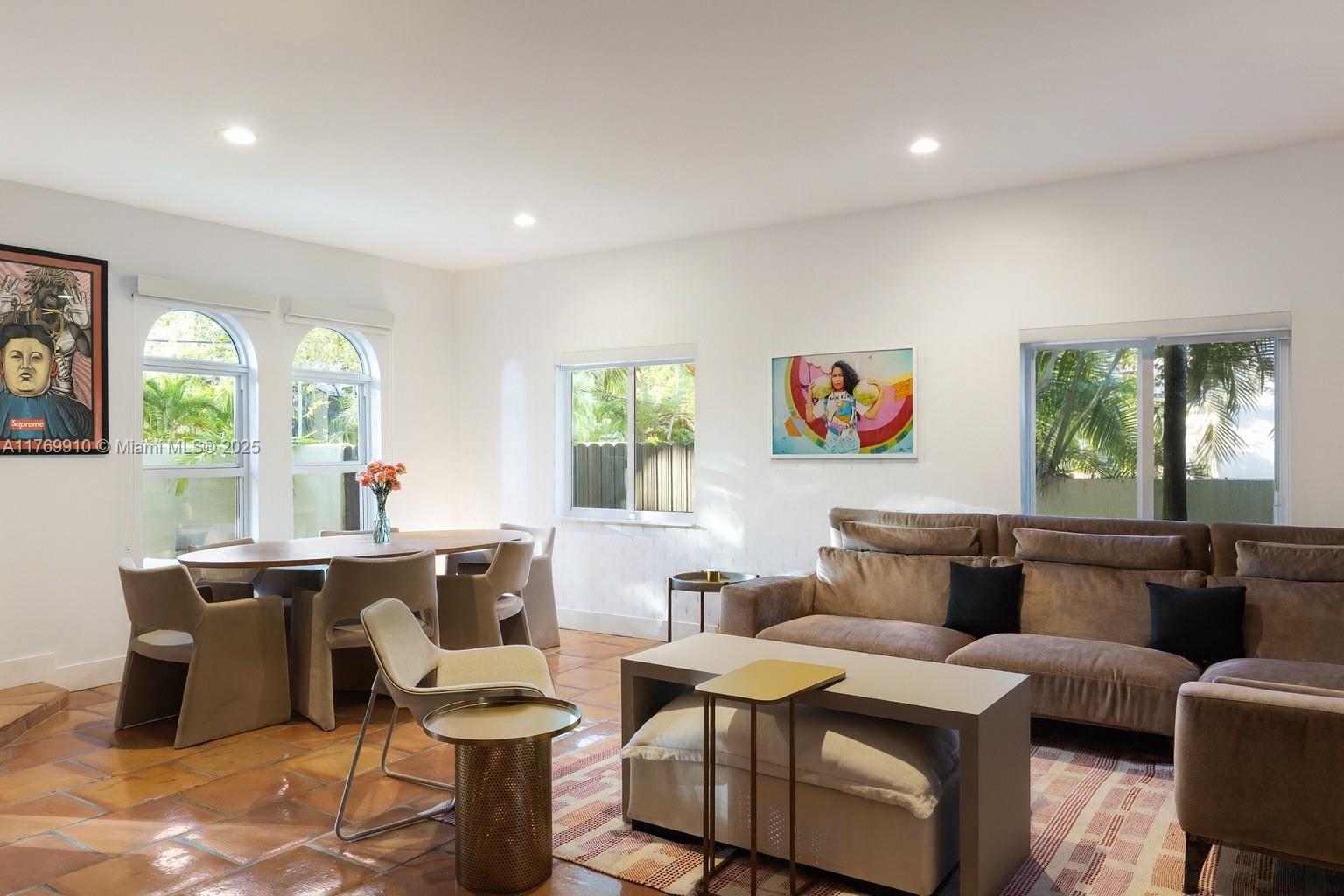 Nestled in a gated community the heart of Coconut Grove, this charming French-style farmhouse exudes timeless elegance and rustic warmth. Featuring all the luxurious & up to date details one could ask for, this mini ‘chateau’ seamlessly blends modern design with classic comfort. The lush, tropical landscaping surrounds a serene garden, offering a peaceful retreat just a 2 minutes walk from the vibrant energy of Grove centre (Park Grove, Sadelles, etc). With its inviting ambiance and one of a kind character, this townhouse is the perfect blend of old-world charm and contemporary living. 3 bed + loft, 2.5 bath, 1830 sqft interior, (2200 sqft inc. garden).