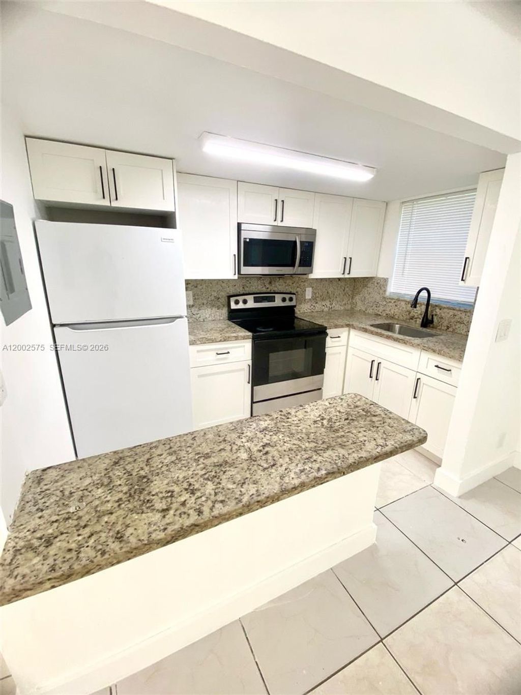 Photo of 850 SW 74 Ter #1, North Lauderdale, FL 33068 (MLS # A12002575)