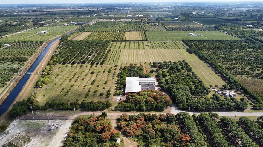 Own a piece of history with this amazing opportunity to own one of the first Longan groves in the Redland area. 31+ acres of income producing farm operation in place for many years. The grove features 1060 Longan trees, 1250 White Guava trees, 1220 Red Guava trees, 325 Sweetheart Lychee trees, 95 Thai Mango trees and 290 Wampee trees. There is a variety of mature trees as well as a third of the property recently replanted. The property has a 10,000 sq ft warehouse w/ loading dock and 2 large walk-in coolers. Fully irrigated with 3 Diesel pumps, fully fenced & gated w/ 16 camera security system. Bonus of two abandoned properties onsite that could be easily renovated for workers living quarters or rental income. 2 separate folios #30-7809-000-0241 and #30-7809-000-0231
