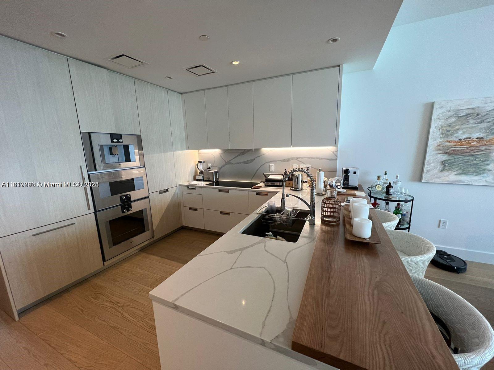 15701 COLLINS CONDO - Residential Lease
