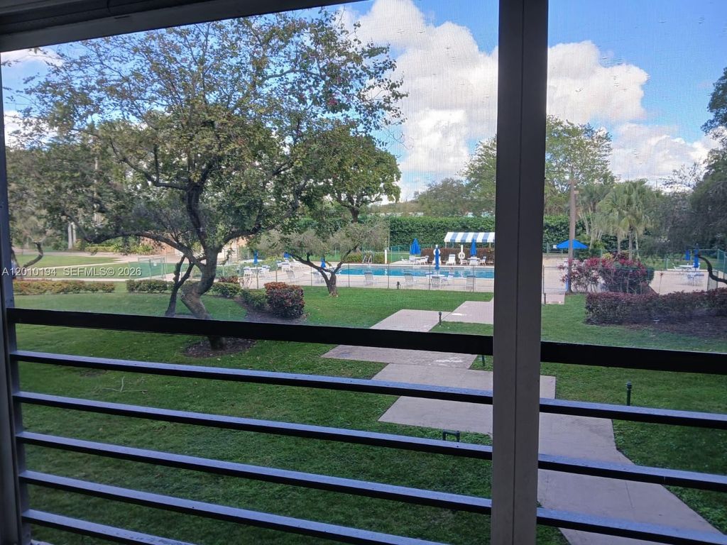 Photo of 1300 Saint Charles Pl #222, Pembroke Pines, FL 33026 (MLS # A12010194)