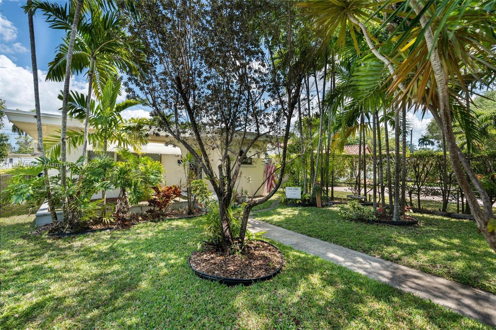 Beautiful Charming Shaded Miami Springs Home. This 2 bedroom 2 bath Home maintains most of its original charm. Features include a new roof, updated electrical, updated kitchen and a backyard work shop. Walk to the Miami Springs Aquatic & Community center. Play Golf at the soon to be renovated golf course. Move in and enjoy.