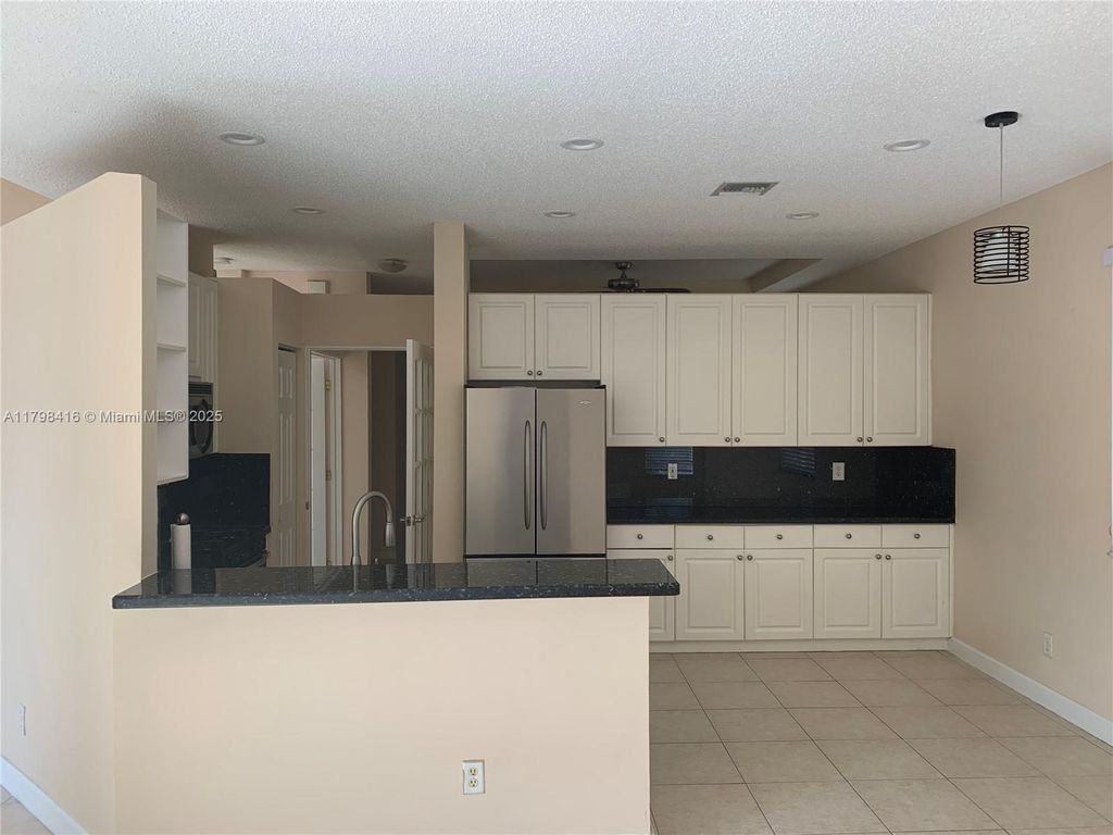 Photo of 19462 SW 68th St, Pembroke Pines, FL 33332 (MLS # A11798416)