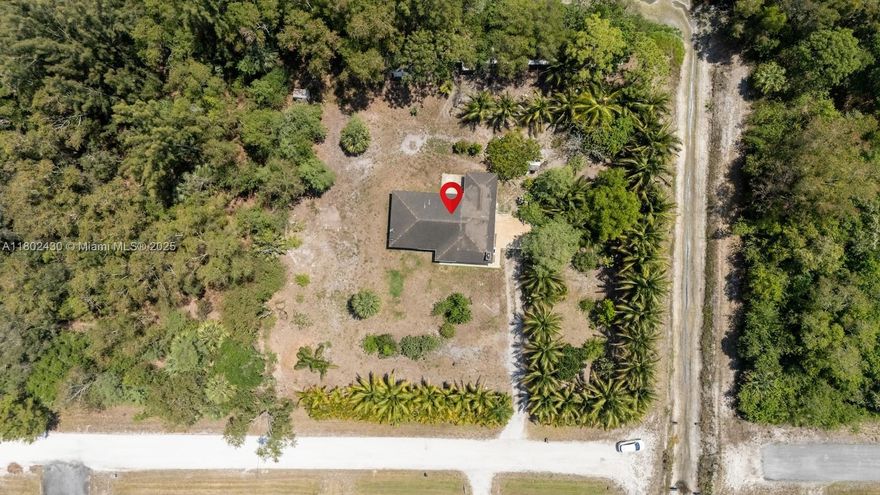 Spacious 3BR/2BA single-family home on a 1.47-acre lot in desirable Loxahatchee. The property needs some TLC but has incredible potential—perfect for investors, homeowners, or equestrian enthusiasts. Located in a horse-friendly community with no HOA. Property features a variety of mature fruit trees including mango, jackfruit, coconut, and more—an ideal setup for anyone who enjoys fresh, tropical fruit right in their backyard. Three adjacent lots are also available for sale. The city is actively upgrading the street with new asphalt paving in progress. Enjoy peaceful, rural living just minutes from new shopping centers, restaurants, and grocery stores. Cash or conventional financing preferred due to condition.