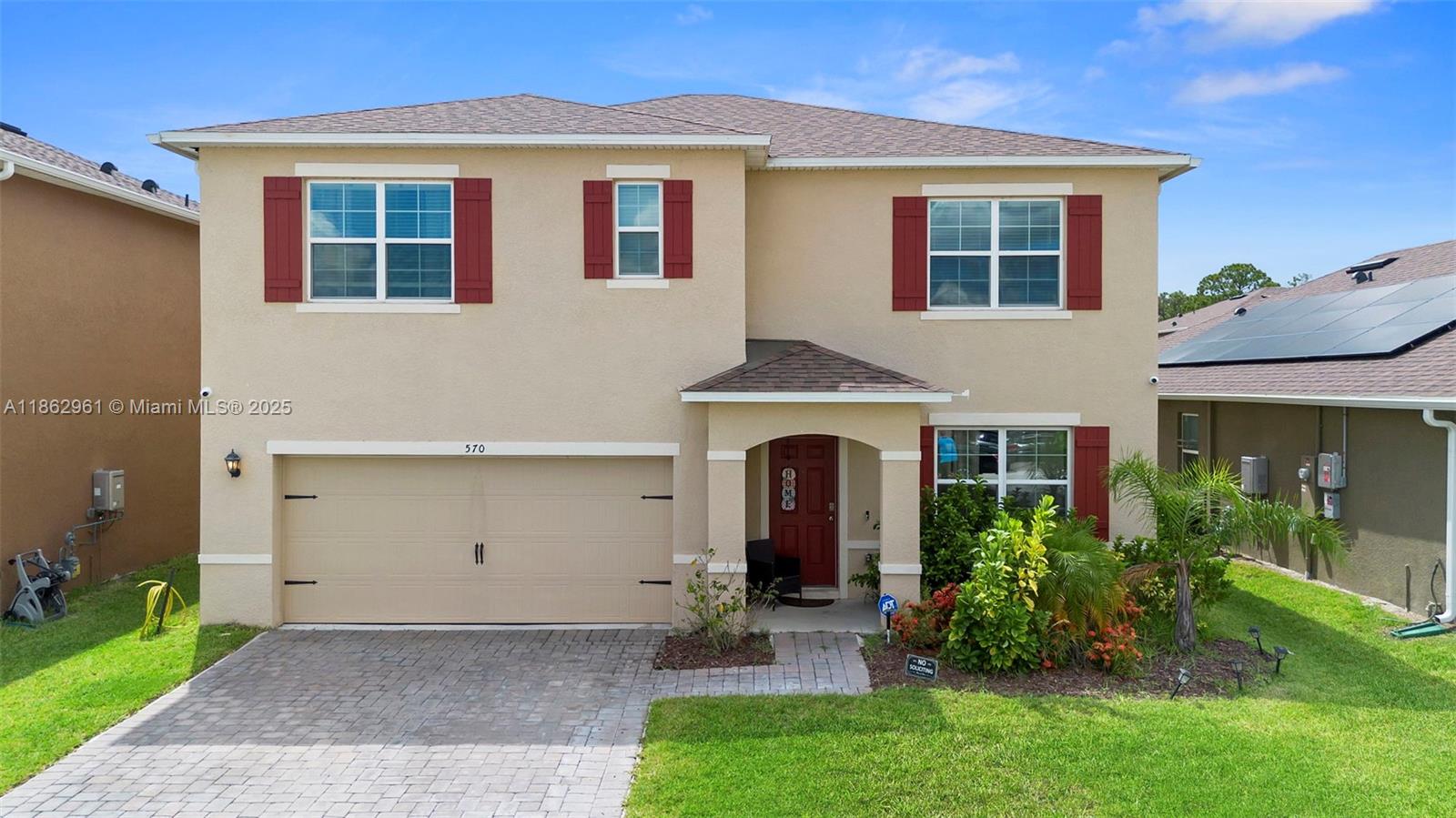 Welcome home! Just minutes from convenient access to I-4, public transit, and shopping, this beautiful residence offers both comfort and accessibility. Enjoy an oversized kitchen and dining area featuring granite countertops, stainless steel appliances, elegant shaker cabinets, and a spacious walk-in pantry. Tile flooring runs throughout the home, with cozy carpeting in the bedrooms and the upstairs owner's suite. Located in the desirable Riviera Bella community, you'll enjoy resort-style outdoor amenities that make everyday living feel like a getaway.