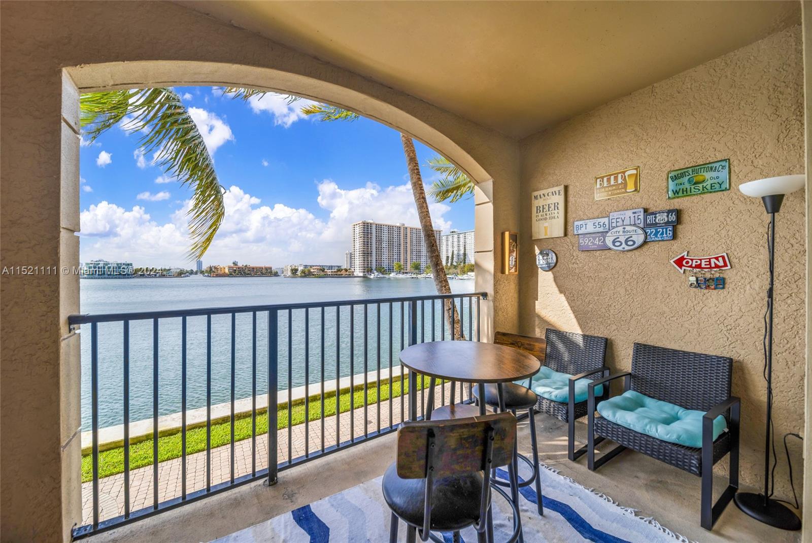 Introducing a stunning 2 bed / 2 bath condo nestled just blocks away from the pristine beaches of Sunny Isles. Boasting a split floor plan and 1116 sq ft of living space, this gorgeous condo features newly installed laminate flooring throughout and a spacious kitchen perfect for culinary creations. Enjoy breathtaking, unobstructed water views from every room, illuminating the bright and airy ambiance. Convenience meets luxury with laundry facilities inside the unit. The secured building offers resort-style amenities including a gym, heated pools, waterfront exercise path, secured garage, jacuzzi, business center, club house, conference room, and more, ensuring a lifestyle of comfort and sophistication. Experience coastal living at its finest in this captivating oasis.