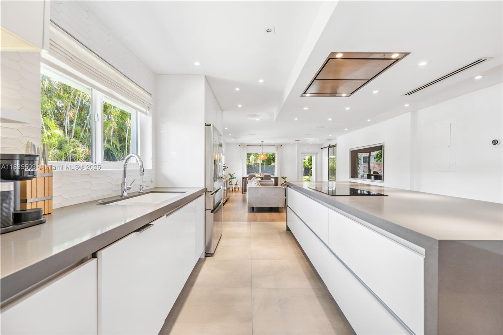 Very chic house with a 3-bedroom, 2-bathroom residence nestled in one of Miami’s most charming and rapidly growing neighborhoods. This house can be rented furnished or unfurnished. Located just minutes from Biscayne Boulevard and the Design District, this property offers not only a beautiful home but an exceptional lifestyle filled with elegance and convenience.
The highlight of the home is the spectacular outdoor grill area, inspired by the earthy luxury of Tulum, and a ceiling-integrated Bose sound system for a home theater experience in the living and kitchen areas.
Ideal for relocating families, the area offers top-rated public and private schools. Just minutes away, you’ll find golf courses, tennis courts, and plenty of green areas to enjoy the outdoors with loved ones.