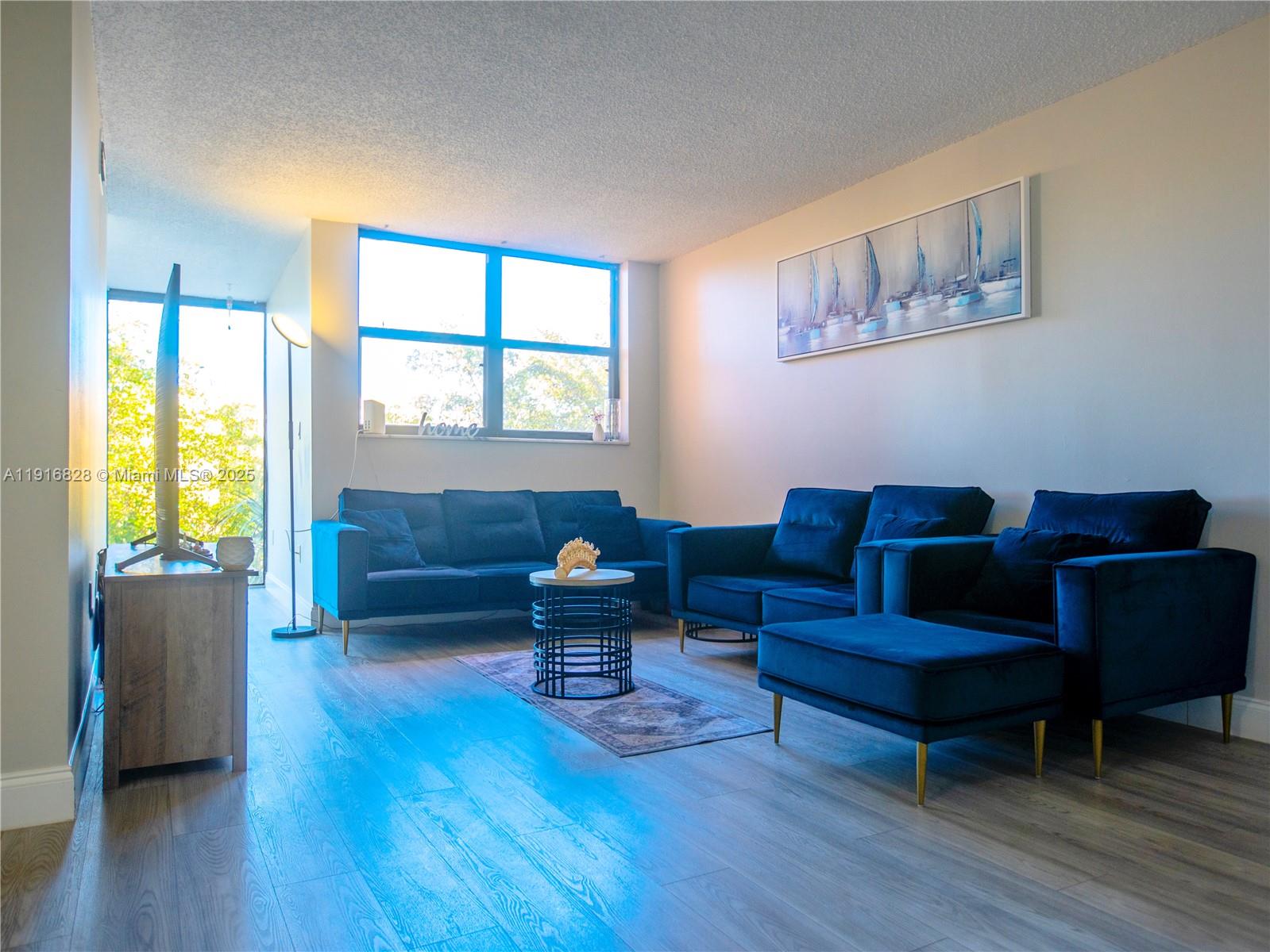 VERSAILLES GARDENS II CON - Residential Lease