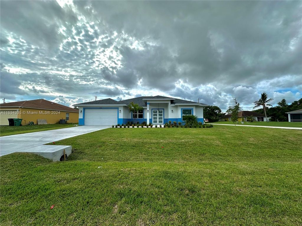 Photo of 490 SW Dauphin Ave, Port Saint Lucie, FL 34953 (MLS # A11534335)