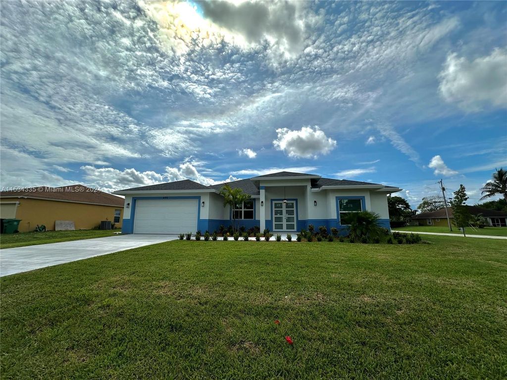 Photo of 490 SW Dauphin Ave, Port Saint Lucie, FL 34953 (MLS # A11534335)