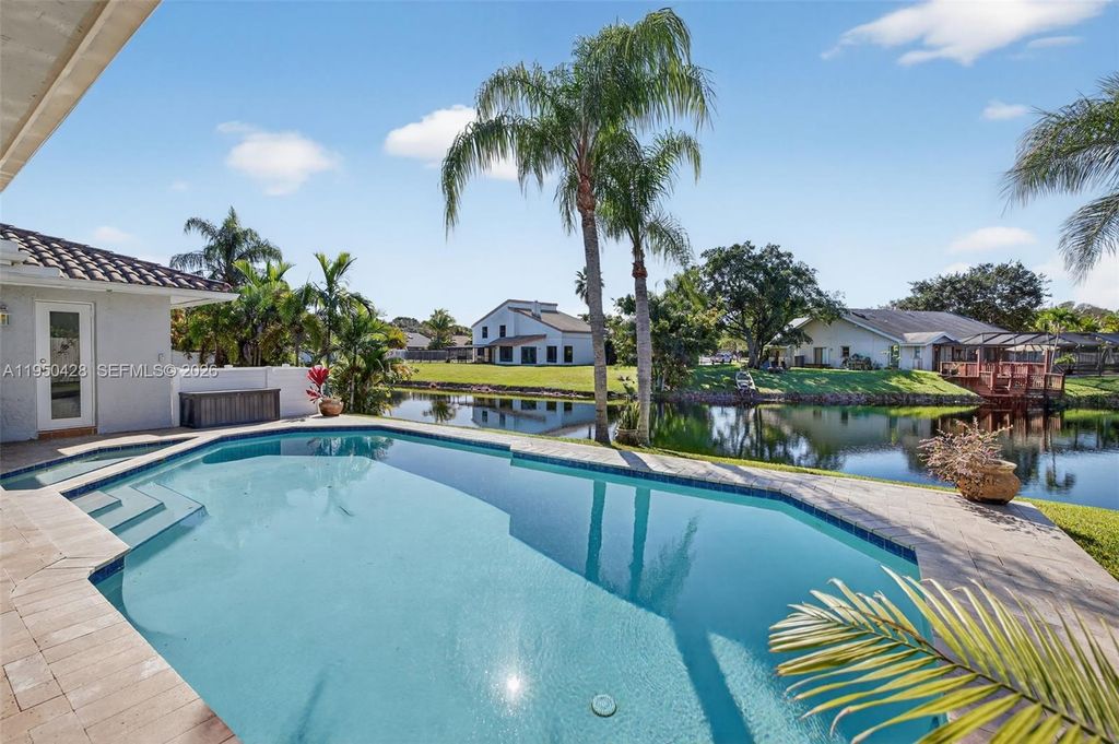 Photo of 9090 NW 11th Ct, Plantation, FL 33322 (MLS # A11950428)