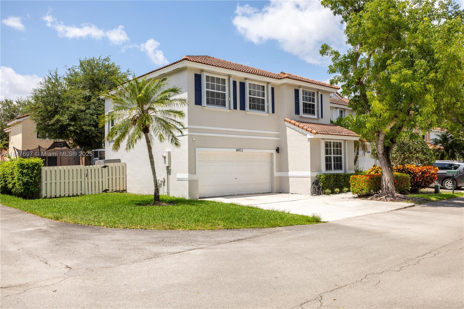 Beautiful 4-bed, 2.5-bath home in the heart of Davie, located in a quiet, well-maintained community near top-rated schools, parks, and shopping. Featuring 1,982 sq ft, a modern kitchen with new countertops and stainless steel appliances, high ceilings, formal living/dining areas, spacious family room, screened patio, and fenced yard. The primary suite offers dual sinks, soaking tub, walk-in closet, and glass shower. Includes in-unit laundry, and 2-car garage. Roof original.