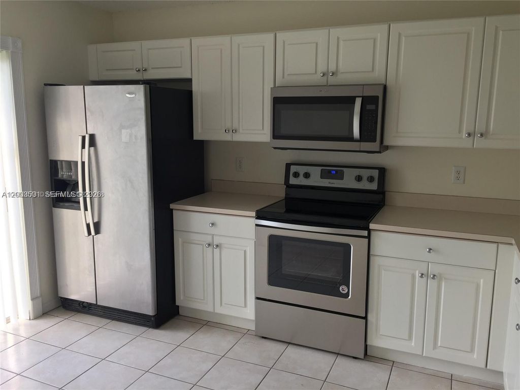 Photo of 20841 NW 2nd St, Pembroke Pines, FL 33029 (MLS # A12003501)