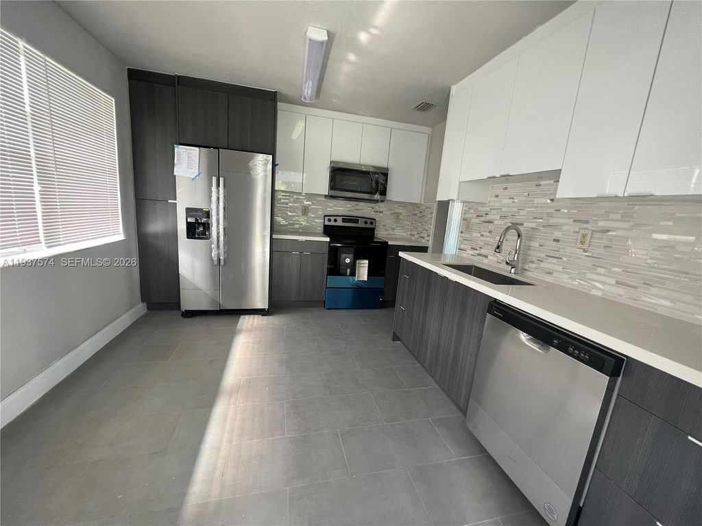 Photo of 4321 NW 12th Ter, Oakland Park, FL 33309 (MLS # A11937574)