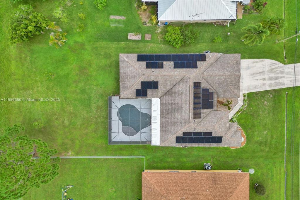 Photo of 6029 NW Winfield Dr, Port St Lucie, FL 34986 (MLS # A11880680)