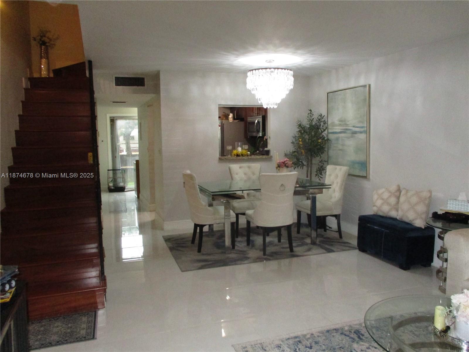 Located in a small, well kept townhome community of 19 homes. Park Plaza is located on a dead end street in a quiet residential community close to downtown Hollywood, transportation and shopping. The interior features porcelain tile on the first floor, an updated kitchen with stainless steel appliances, wood cabinetry & granite counters. There are sliding glass doors with a private patio area. The upstairs features laminate floors throughout, a large master suite with a private balcony. The bathroom has been completely remodeled. The living room has recessed lighting and there is a new washer dryer and water heater. Low monthly maintenance which includes liability and flood. The association is responsible for the roofs. Pet friendly community! Two years residency required before renting.