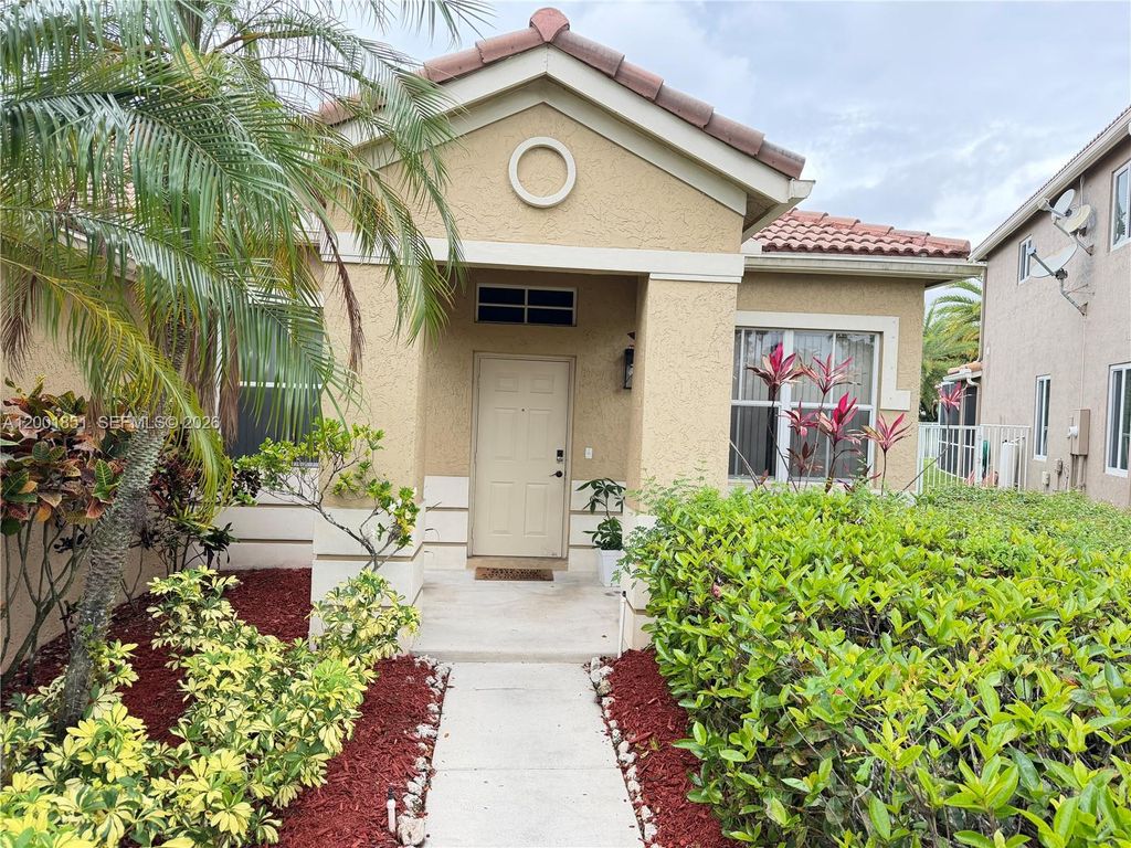 Photo of 1006 Sunflower Cir, Weston, FL 33327 (MLS # A12001851)