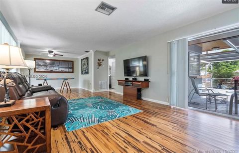 Tiny photo for 1891 NW 31st Ct, Oakland Park, FL 33309 (MLS # A12026827)