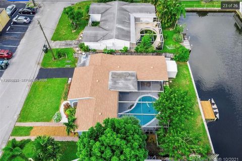 Tiny photo for 1891 NW 31st Ct, Oakland Park, FL 33309 (MLS # A12026827)